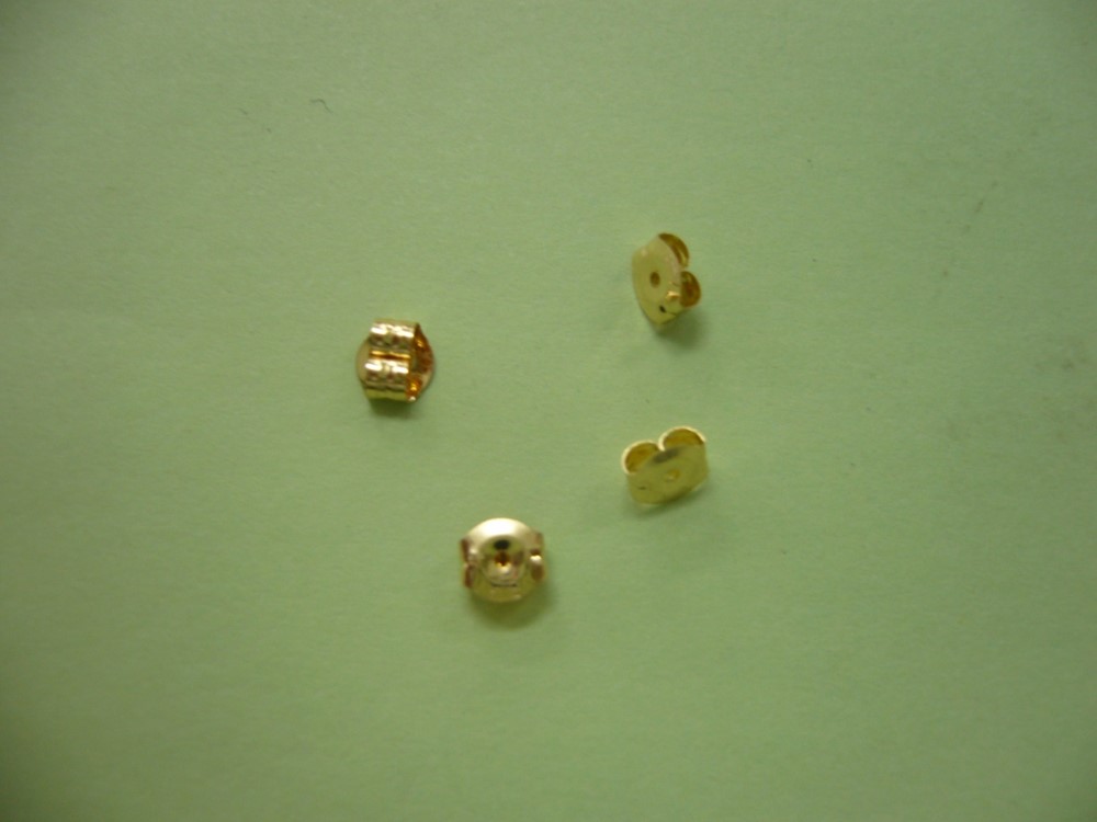 装飾品ピアスを止めるキャッチ 飯能精密工業 株式会社